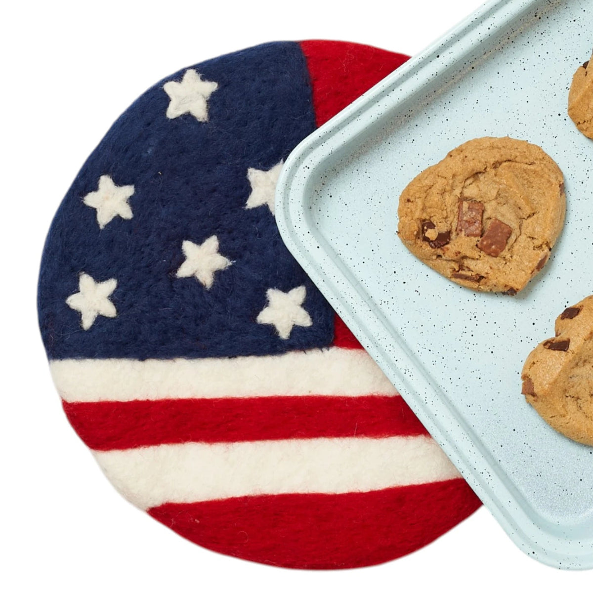American flag trivet with a tray of cookies on a white background