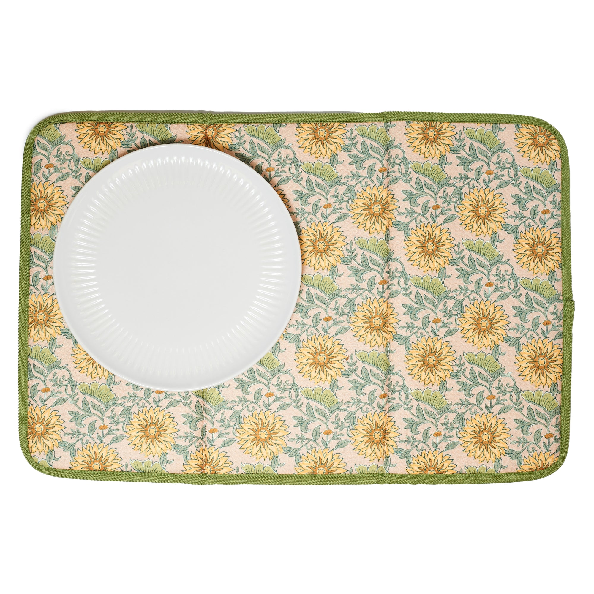 Floral patterned drying mat with yellow flowers on a green border