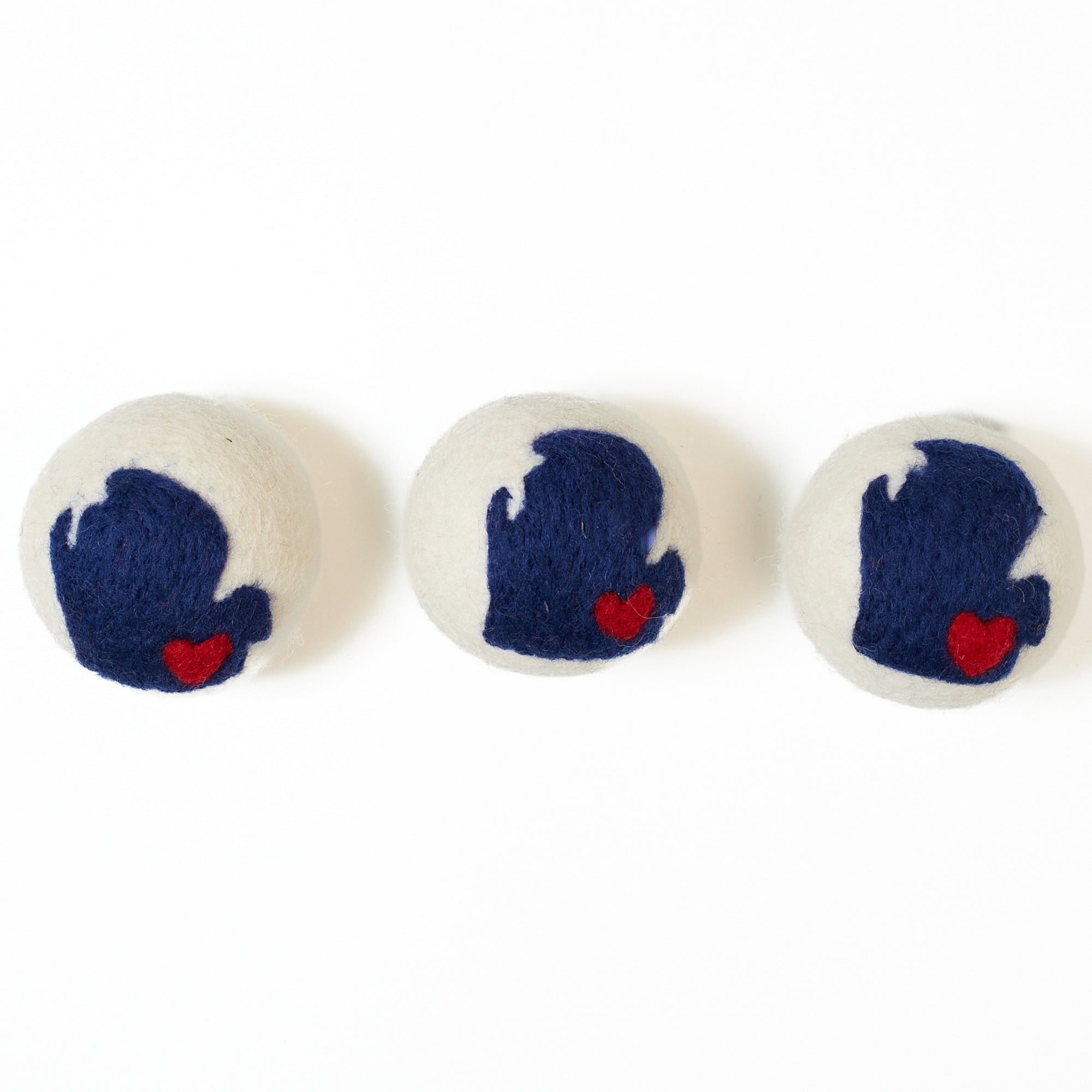 Three round dryer  balls with state of Michigan