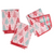 Set of four Christmas-themed napkins with tree patterns on a white background