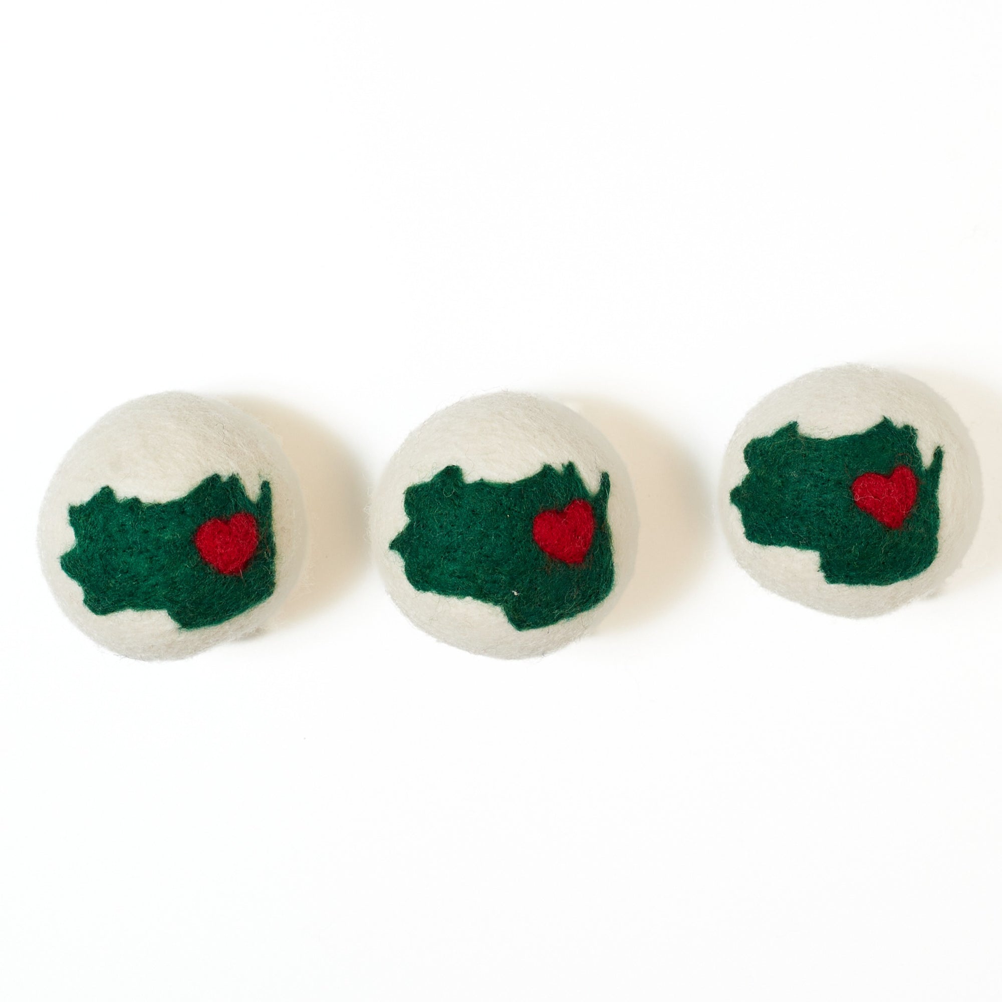 Three felted wool dryer balls with state of Wisconsin