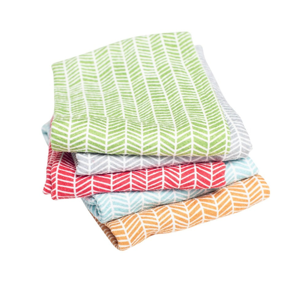 Colorful kitchen towels stacked on each other